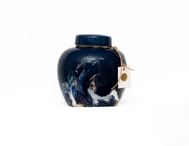Bill Pratt’s deep-blue commissioned vessel with a hand-painted ocean wave